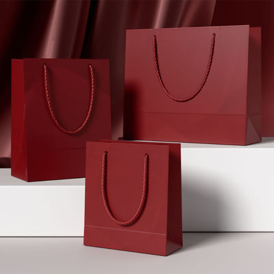 Besondere Kleidung Einkaufstüten Verpackung Luxus Elfenbeinkarton Kraftpapier Billigpreis Einkaufstüte Geschenkgutschein