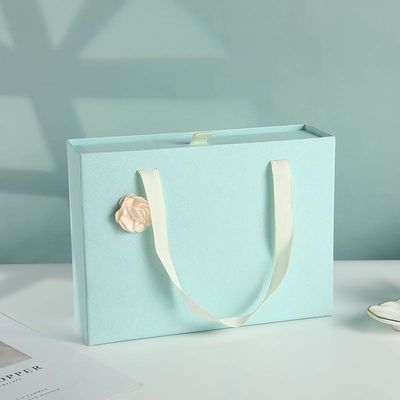 ODM OEM akzeptiert. Kostenlose Probe tragbare leere Schiebe aus Verpackung starre Schublade Typ Geschenk-Box Tasche mit Band