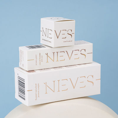 Blind Embossed Design Klappbare Kraft-PET-Papierboxen für Kosmetika Parfüm Versand Geschenke einschließlich Folie